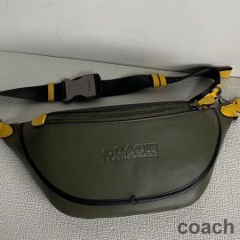 Taška na opasek Coach League v barvě Colorblock Calf Leather Green/Yellow