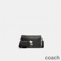 Coach Heritage wandelbare Umhängetasche aus strukturiertem Leder mit Peanuts-Snoopy-Motiv in Schwarz