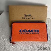 Portfel akordeonowy Coach ze skóry Pebble w kolorze pomarańczowym