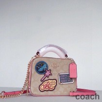 Torba typu crossbody Coach Box z płótna Signature Canvas z naszywkami Disney Khaki/Róż