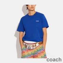 Torba na pas Coach Charter 7 w kolorze Pebble Leather z naszywkami w kolorze białym