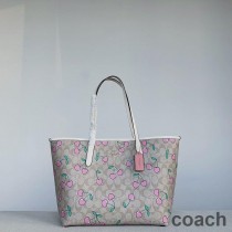 Torba Coach City z płótna Signature Canvas z nadrukiem w kształcie serca i wiśni w kolorze khaki/różowym