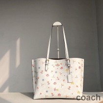 Torba Coach City Tote z płótna Signature Canvas z mistycznym nadrukiem kwiatowym w kolorze białym