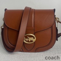 Torba siodłowa Coach Georgie ze skóry groszkowanej i gładkiej w kolorze brązowym