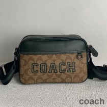 Torba typu crossbody Coach Graham z płótna Signature Canvas z motywem uniwersyteckim Khaki/Zielony