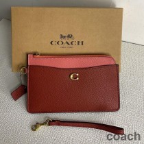 Torebka Coach L Zip Wristlet w kolorze Pebble Leather w kolorze brązowym/różowym
