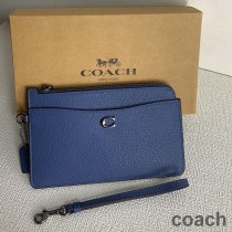 Torebka Coach L Zip Wristlet w kolorze Pebble Leather w kolorze granatowym