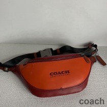 Torba na pas Coach League w kolorze blokowym ze skóry cielęcej w kolorze pomarańczowym/bordowym