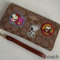 Portfel Coach Long Zip Around z płótna Signature Canvas z motywem orzeszków ziemnych w kolorze kawy