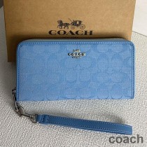 Portfel Coach Long Zip Around Wristlet w kolorze Signature Canvas Blue
