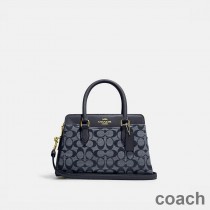 Torba podróżna Coach Mini Darcie Carryall w kolorze Signature Canvas Navy Blue