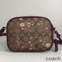 Torba fotograficzna Coach Mini Jamie z płótna Signature Canvas z nadrukiem kwiatów polnych w kolorze bordowym