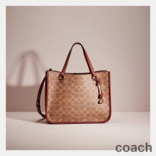 Torba podróżna Coach Tyler Carryall 28 w kolorze Signature Canvas Khaki/Burgund