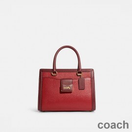 Torba podróżna Coach Grace Carryall w kolorze Pebble Leather w kolorze czerwonym/bordowym