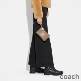 Torebka Coach Small Wristlet w kolorze Colorblock Signature Canvas z motywem króliczego brązu/bieli