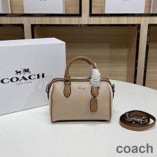 Bolso de mano Coach Mini Rowan en piel granulada y piel curtida albaricoque/marrón