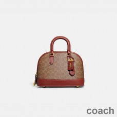 Τσάντα Coach Revel σε Signature Canvas Brown